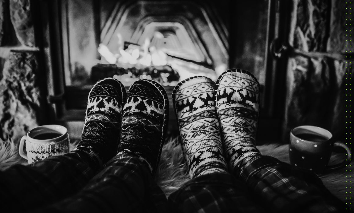 Couple slippers by a fire